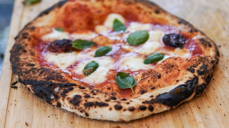 Classic Margherita pizza at dewey's pizza